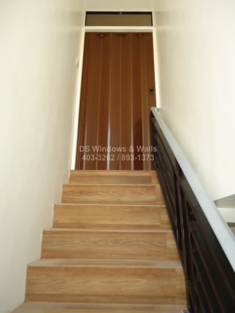 Folding door for tight spaces