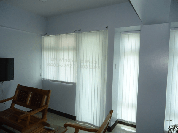 white fabric vertical blinds